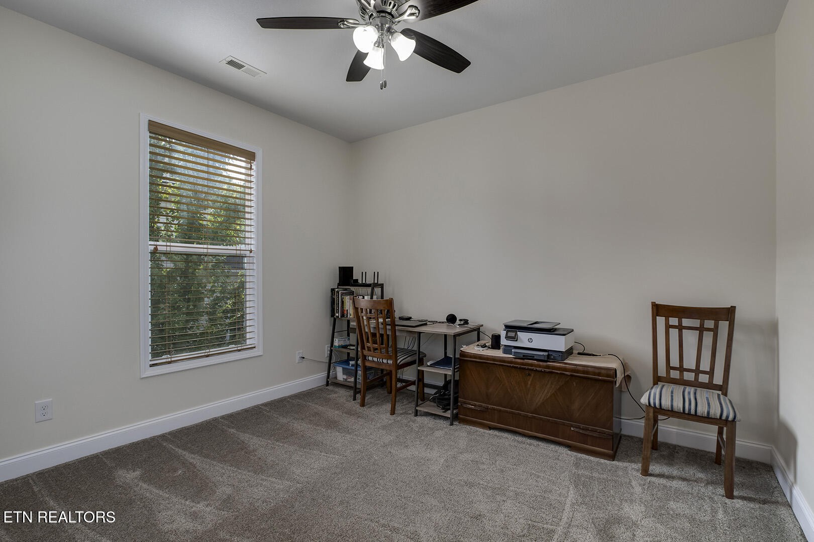 134 Daleyuhski Way Loudon, TN 37774 - Photo 37 of 54 a view of a workspace with furniture and a window
