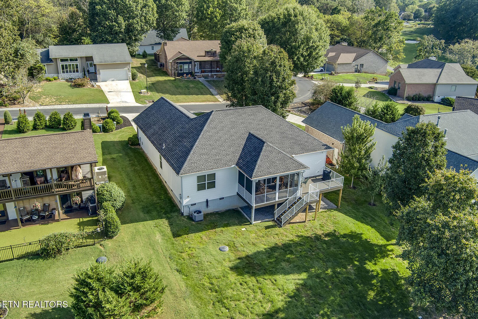 134 Daleyuhski Way Loudon, TN 37774 - Photo 47 of 54 an aerial view of a house with swimming pool and large trees