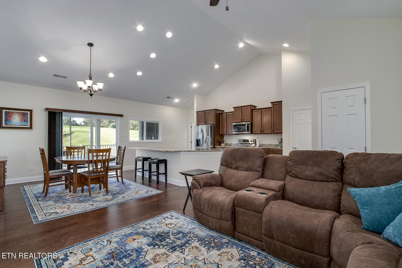 134 Daleyuhski Way Loudon, TN 37774 - Photo 10 of 54 a living room with furniture and a dining table with wooden floor