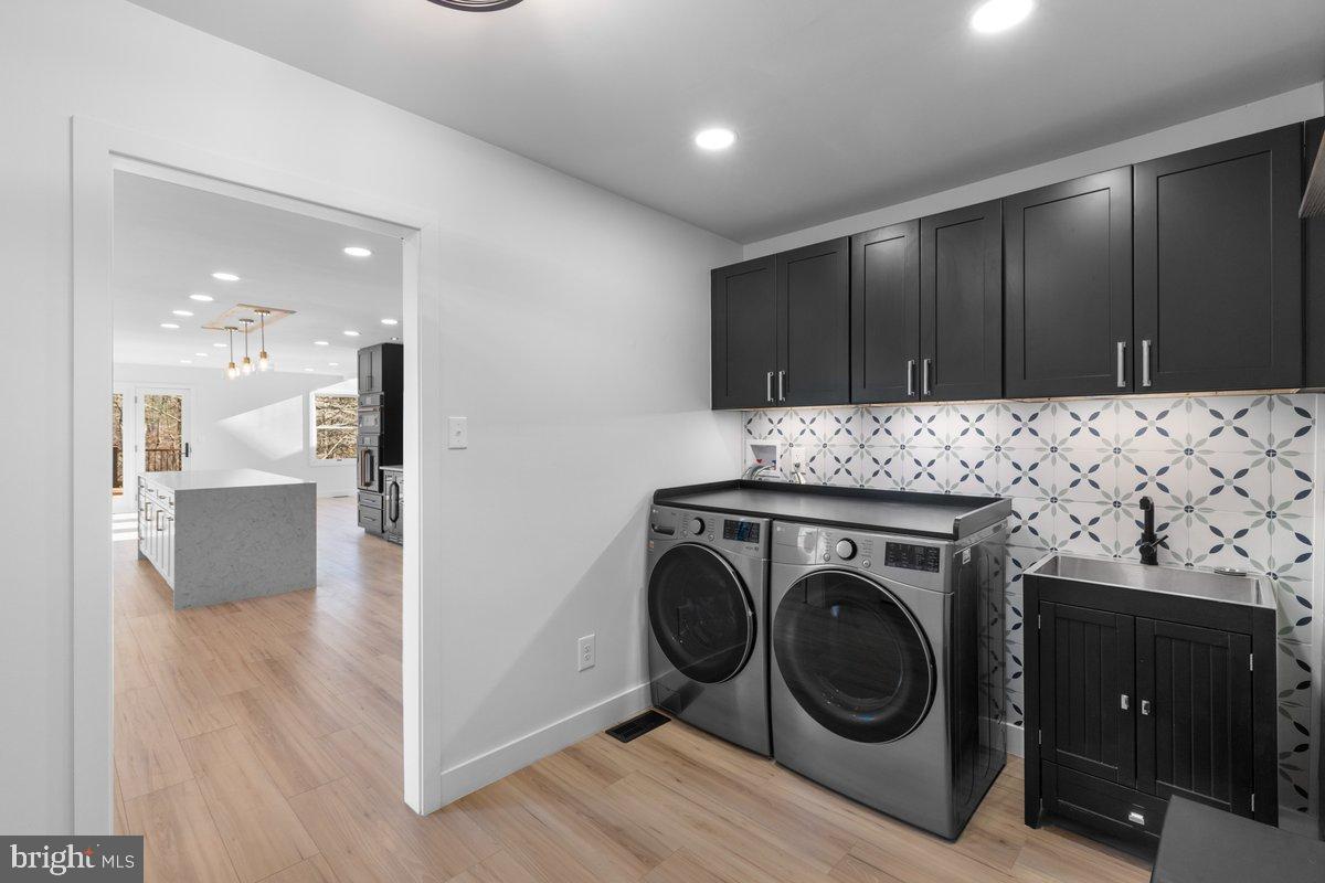 144 Van Dyke Road Hopewell, NJ 08525 - Photo 15 of 59 a view of a kitchen with washer and dryer