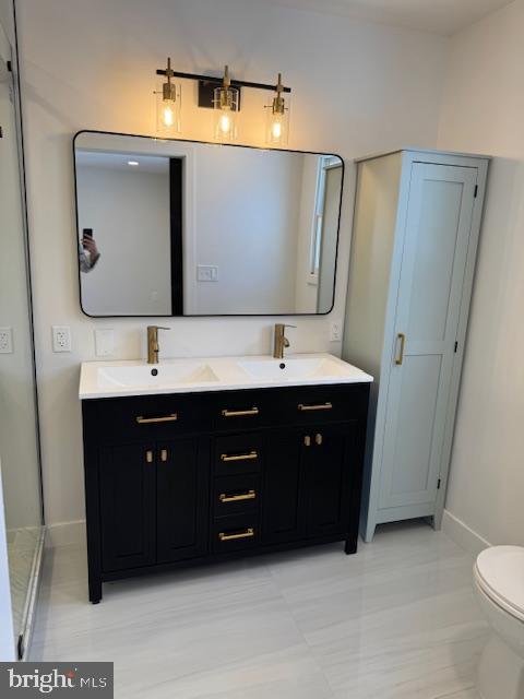 144 Van Dyke Road Hopewell, NJ 08525 - Photo 29 of 59 a bathroom with a double vanity sink and mirror