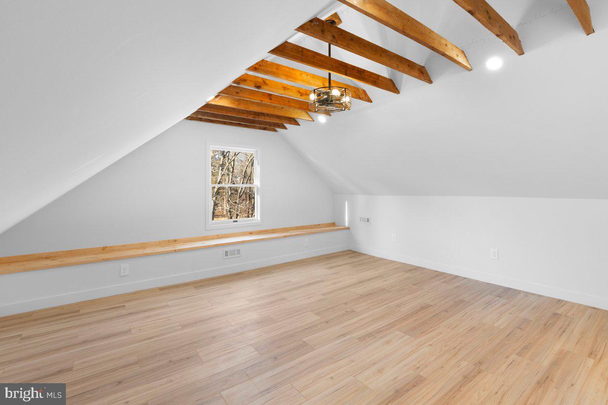 144 Van Dyke Road Hopewell, NJ 08525 - Photo 31 of 59 a view of a room with stairs and a window