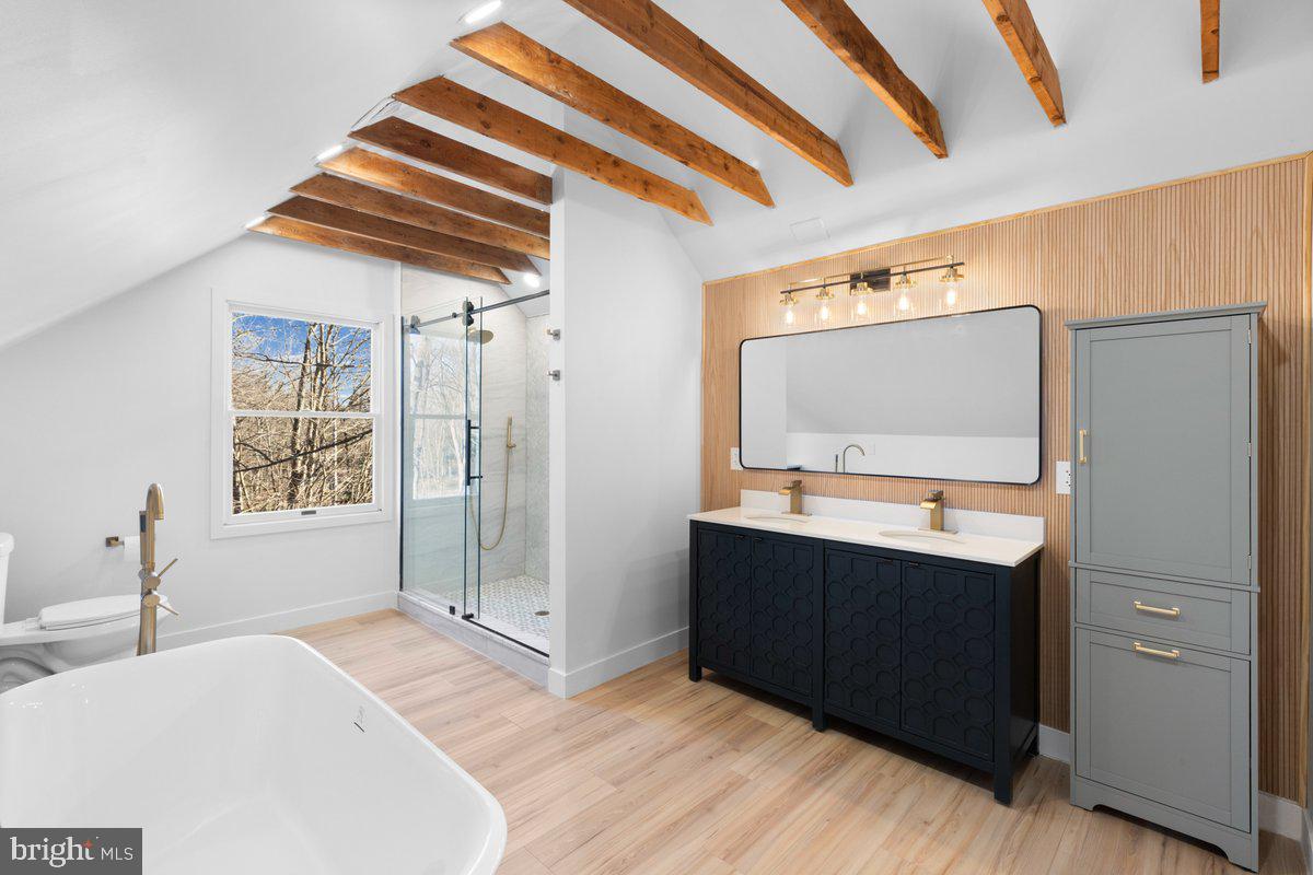 144 Van Dyke Road Hopewell, NJ 08525 - Photo 33 of 59 a kitchen with stainless steel appliances granite countertop a refrigerator and a sink