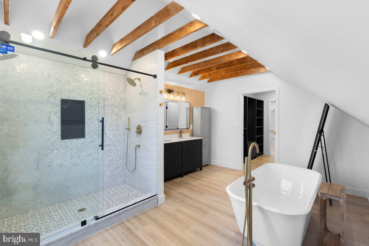 144 Van Dyke Road Hopewell, NJ 08525 - Photo 34 of 59 a bathroom with a bathtub and a shower