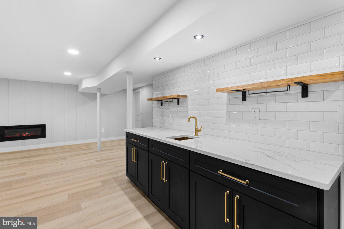 144 Van Dyke Road Hopewell, NJ 08525 - Photo 40 of 59 a kitchen with a sink and cabinets