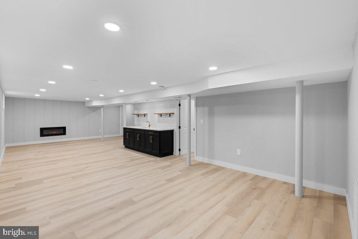 144 Van Dyke Road Hopewell, NJ 08525 - Photo 42 of 59 a view of an empty room with wooden floor