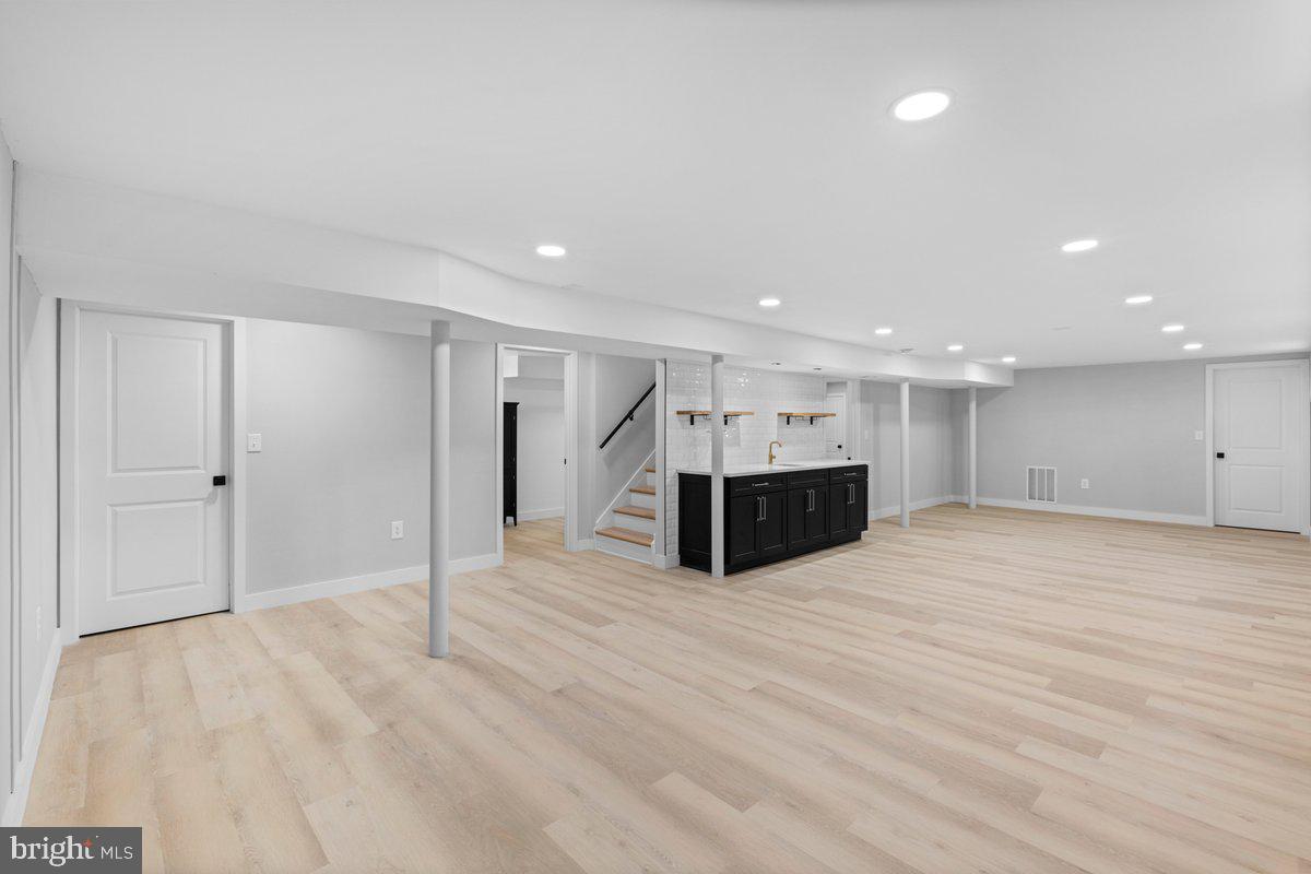 144 Van Dyke Road Hopewell, NJ 08525 - Photo 43 of 59 a view of empty room with wooden floor