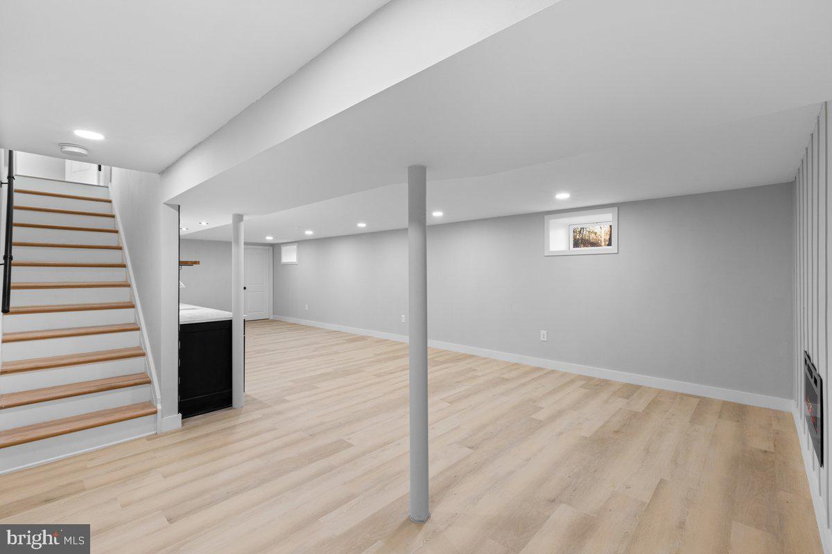 144 Van Dyke Road Hopewell, NJ 08525 - Photo 44 of 59 an empty room with wooden floor and windows