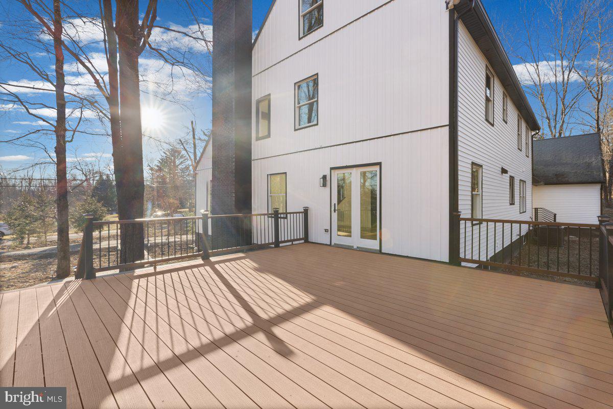 144 Van Dyke Road Hopewell, NJ 08525 - Photo 46 of 59 a view of backyard with a deck and wooden floor