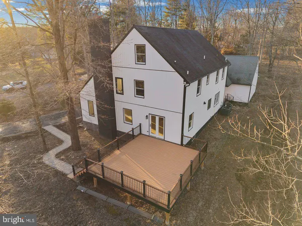 a house with trees in front of it