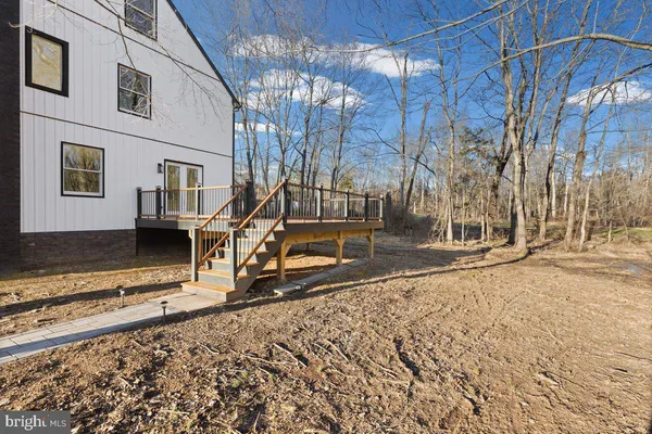 a view of fountain in middle of lake