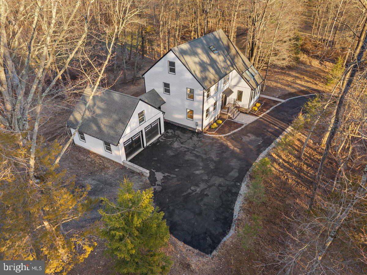 144 Van Dyke Road Hopewell, NJ 08525 - Photo 50 of 59 a view of a house with a yard