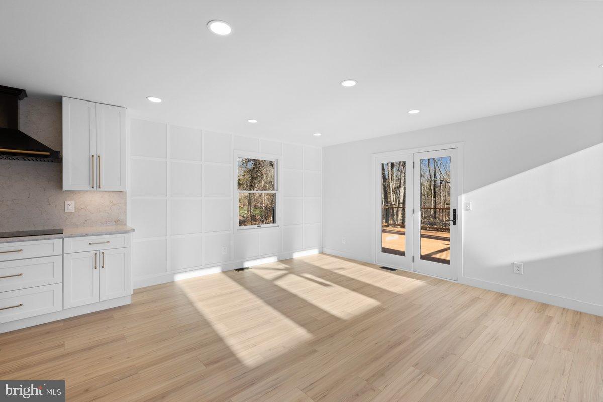 144 Van Dyke Road Hopewell, NJ 08525 - Photo 9 of 59 a bedroom with a bed and a large window