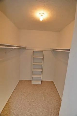 a bathroom with a sink vanity and a mirror