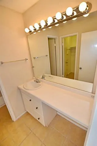 a house with tree in front of it