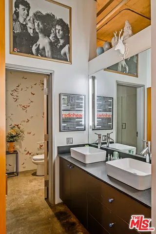 a bath room with a bathtub and shower