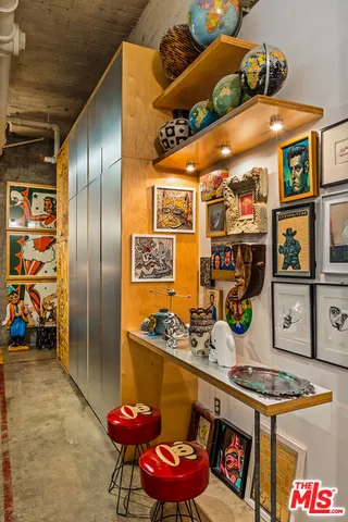 a view of bathroom with a sink and a mirror