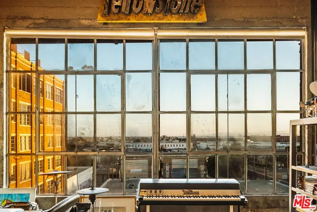 a view of a balcony with city view