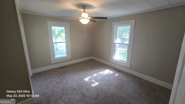 a view of a livingroom with a window