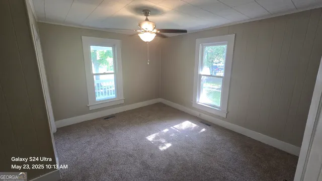 a view of a livingroom with a window