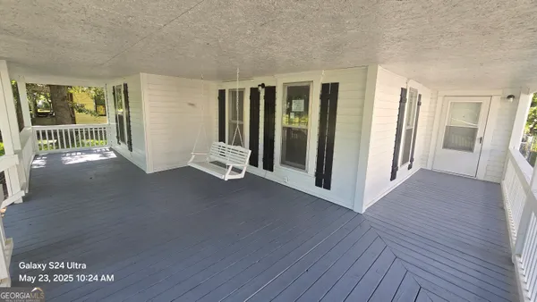 a view of an outdoor space and deck