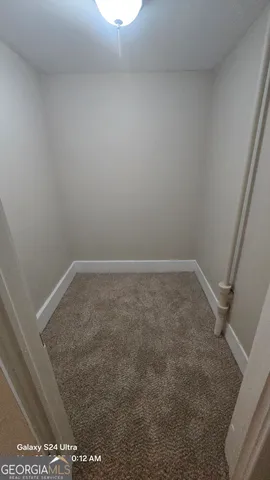 a view of livingroom with hardwood floor and window