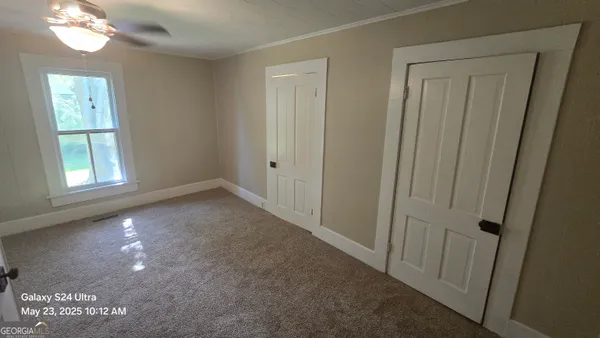 a bathroom with a sink a mirror and a shower