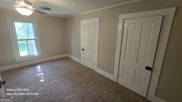 a bathroom with a sink a mirror and a shower