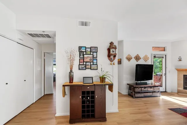 a bedroom with a large bed and a large window