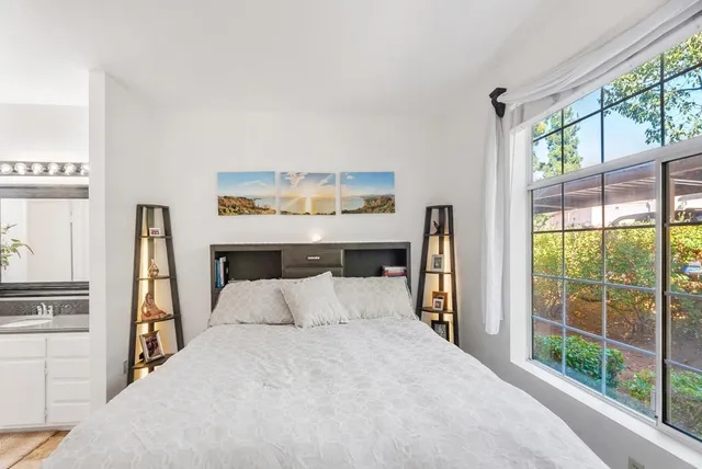 a workspace with furniture and window