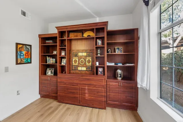 an aerial view of a houses with outdoor space