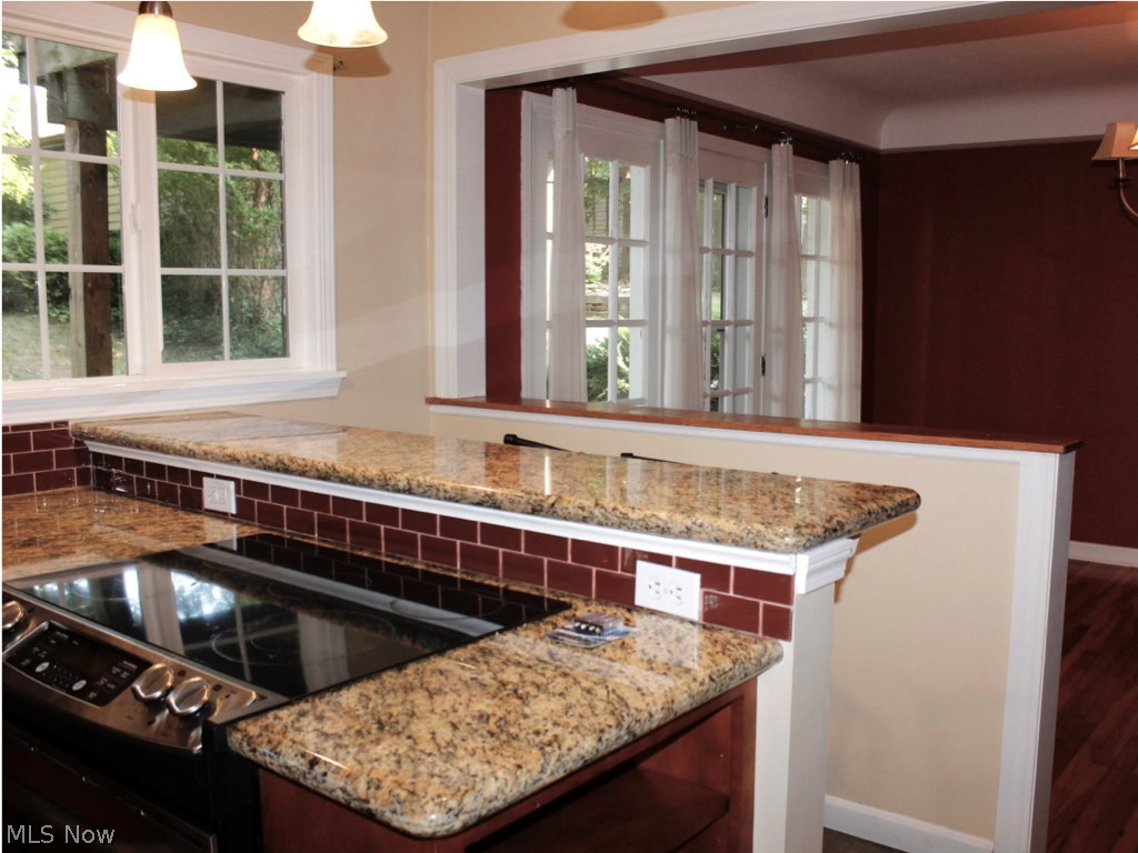 2187 Edgerton Road Cleveland, OH 44118 - Photo 8 of 14 COUNTER FOR CASUAL MEALS....NEW WINDOWS TOO.
