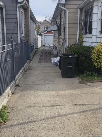 front view of a house with a street