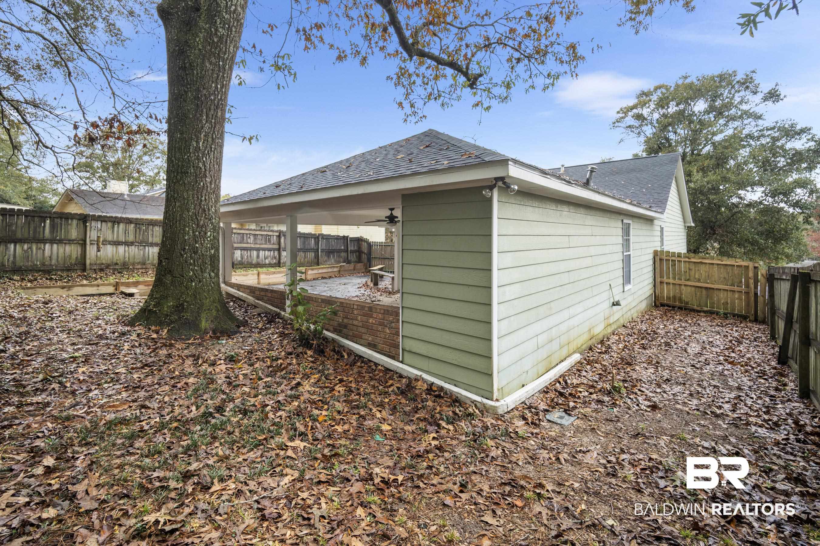 3101 Autumn Ridge Drive West Mobile, AL 36695 - Photo 30 of 36 View of outdoor structure with a fenced backyard