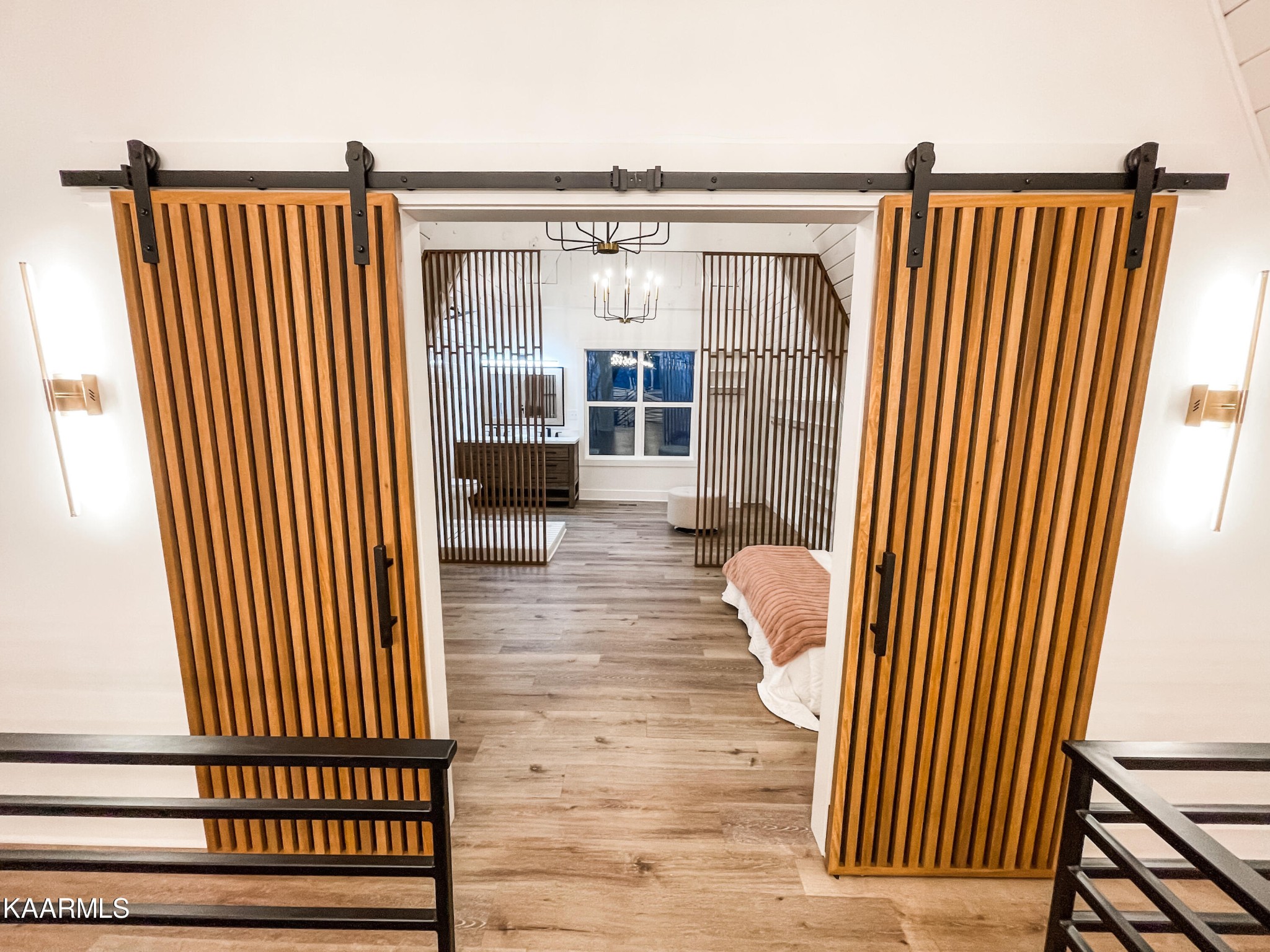 232 East Red Bud Road Knoxville, TN 37920 - Photo 16 of 34 a view of a hallway with wooden floor and furniture