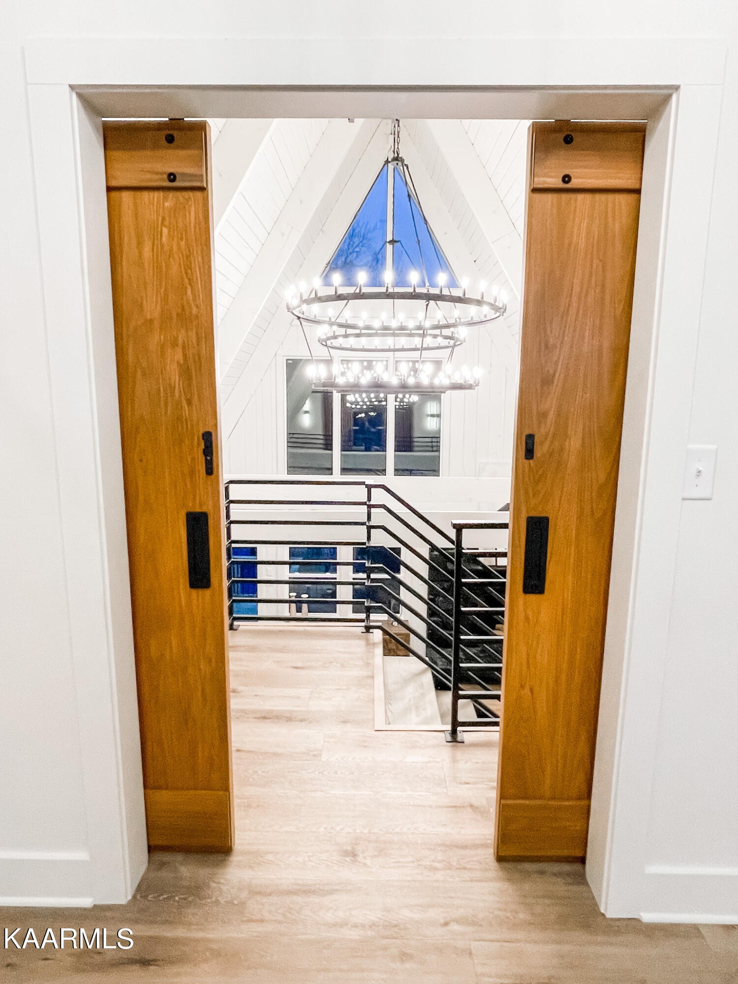 232 East Red Bud Road Knoxville, TN 37920 - Photo 21 of 34 a view of a hallway with wooden floor and furniture