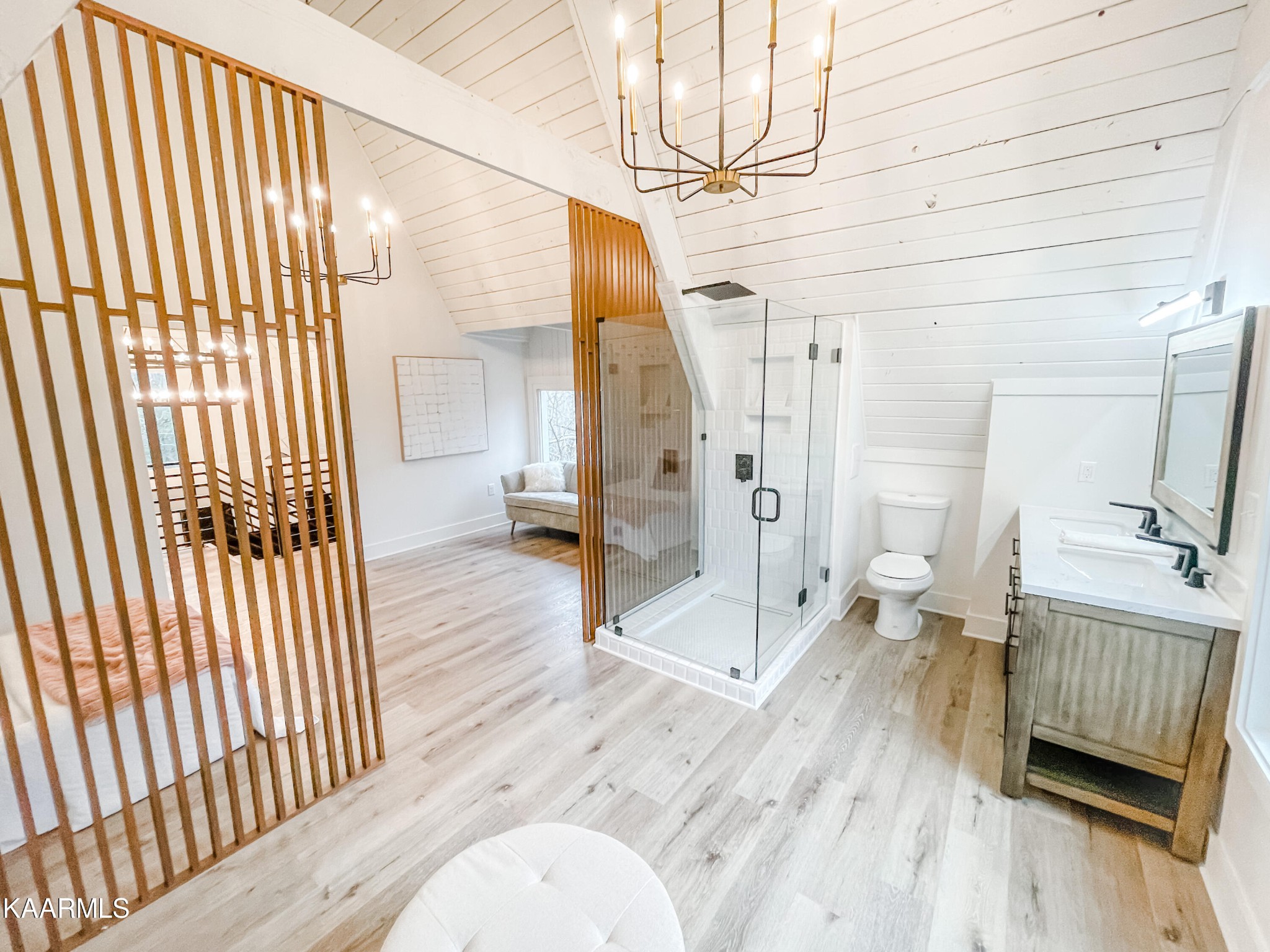 232 East Red Bud Road Knoxville, TN 37920 - Photo 22 of 34 a spacious bedroom with a bed and wooden floor