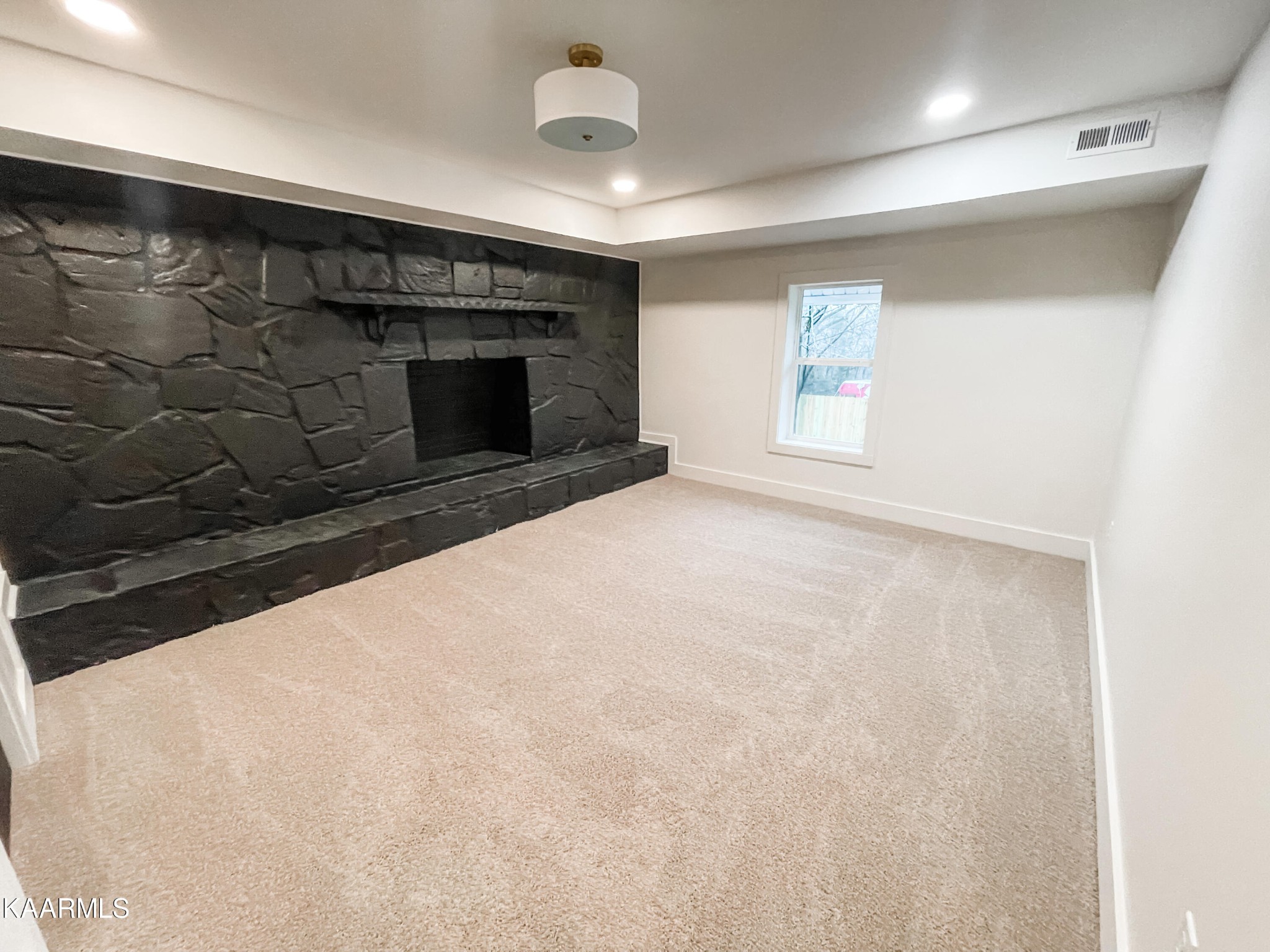 232 East Red Bud Road Knoxville, TN 37920 - Photo 26 of 34 a view of empty room with a fireplace and a window