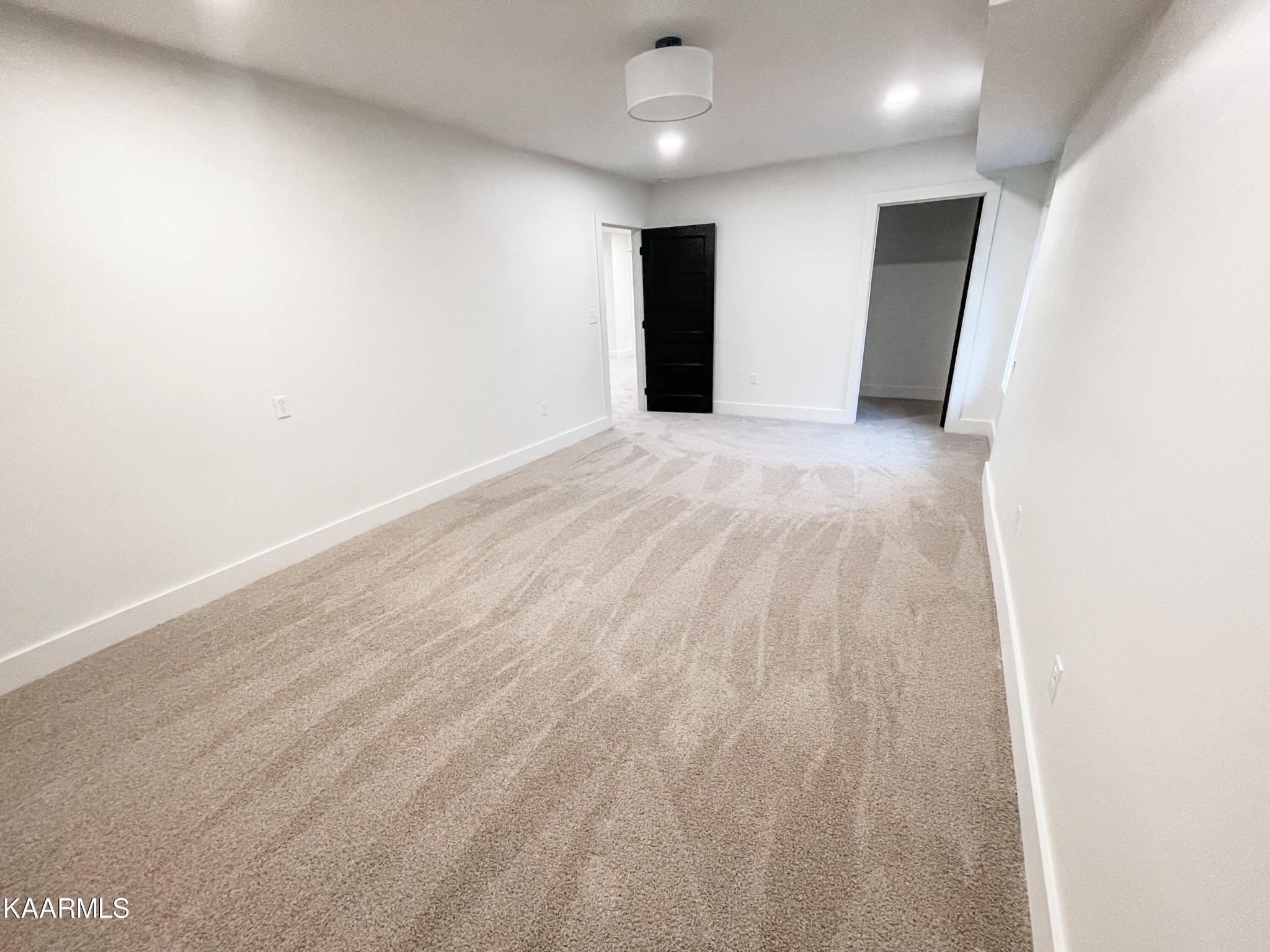 232 East Red Bud Road Knoxville, TN 37920 - Photo 28 of 34 an empty room with wooden floor and windows