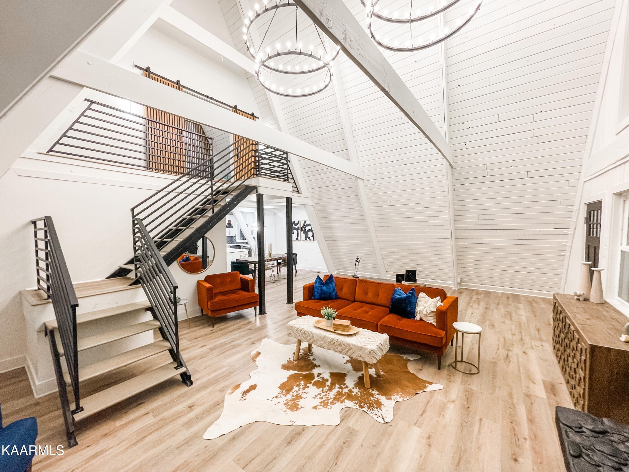 232 East Red Bud Road Knoxville, TN 37920 - Photo 4 of 34 a living room with furniture and a wooden floor