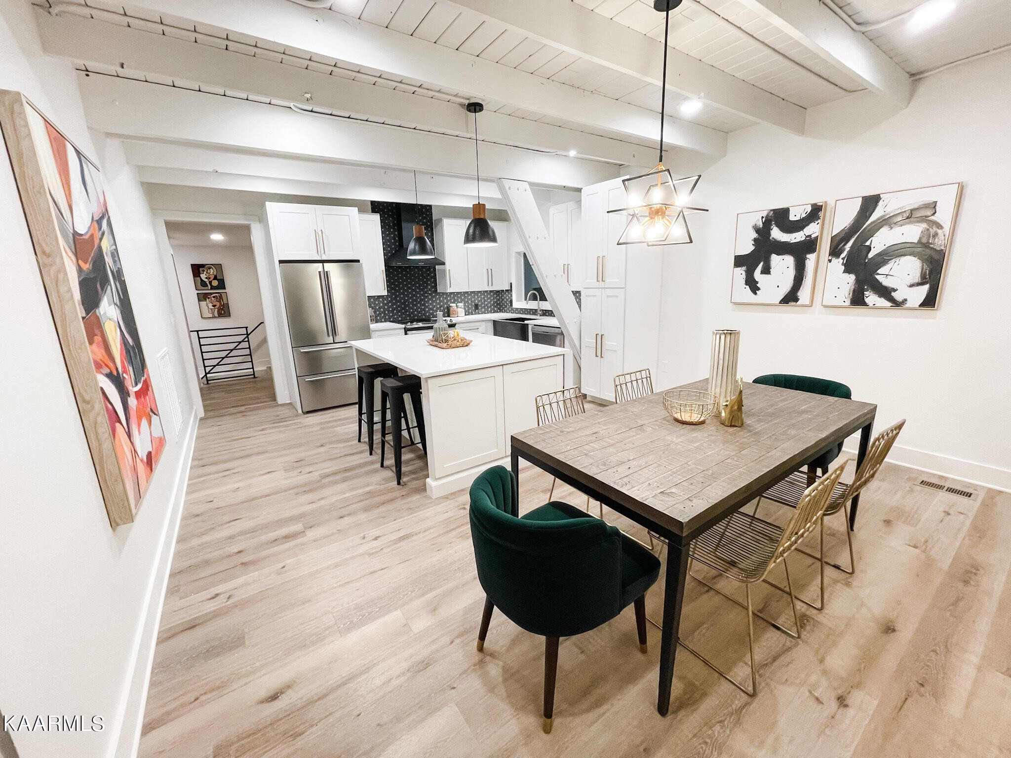 232 East Red Bud Road Knoxville, TN 37920 - Photo 9 of 34 a view of a dining room with furniture and a chandelier