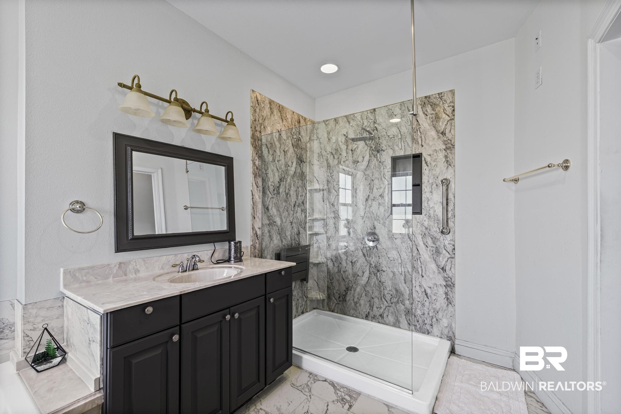 32875 Faircloth Road Lillian, AL 36549 - Photo 38 of 85 Bathroom featuring vanity and a marble finish shower
