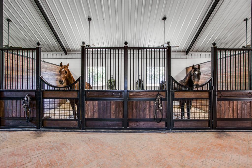 12630 Merrill Road Pilot Point, TX 76258 - Photo 26 of 39 6 oversized stalls, stable comfort mattress systems, nelson auto waters, pocket stall windows, insulated, fly spray system.