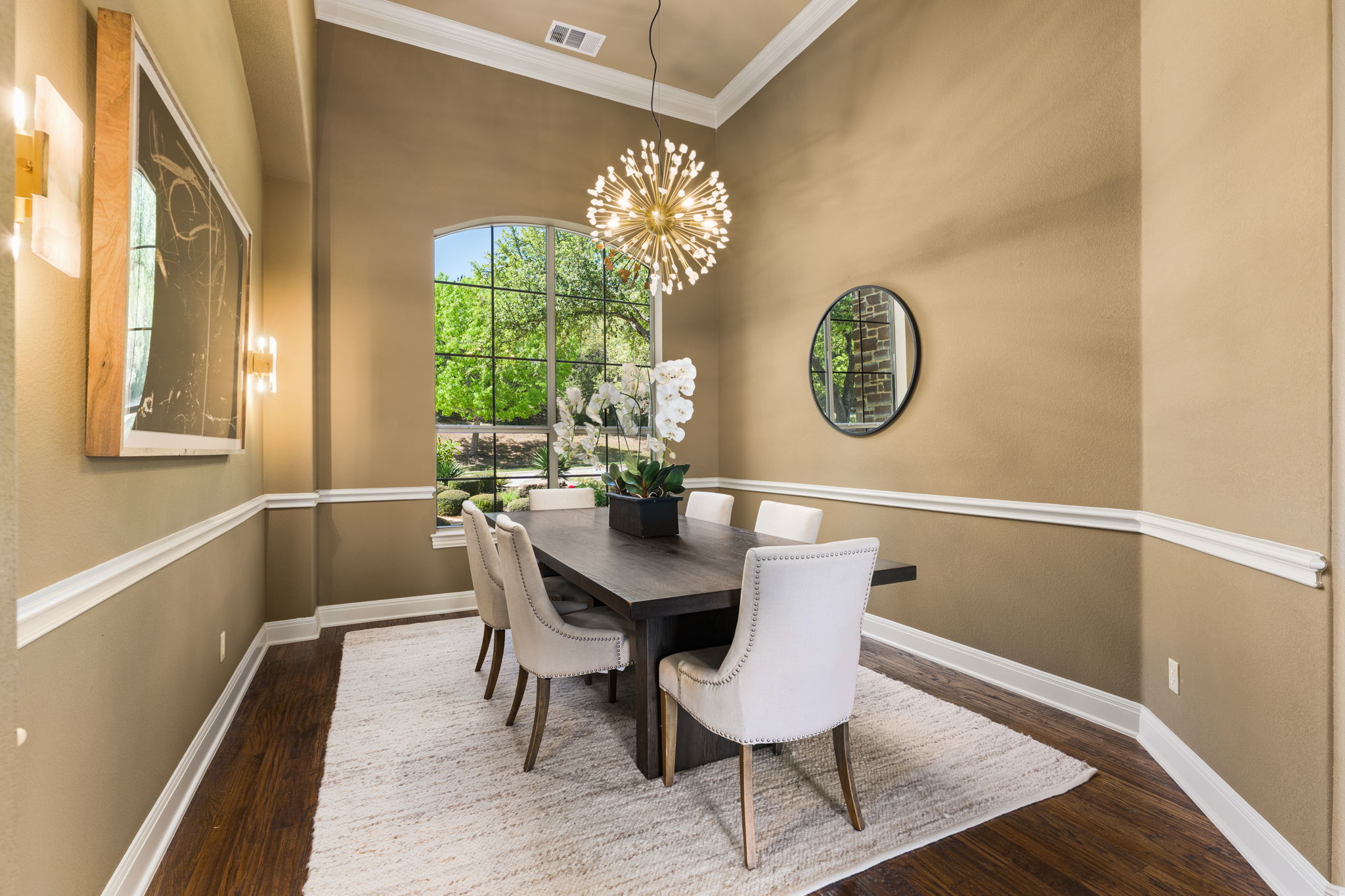 205 Emerald Ridge Drive Austin, TX 78732 - Photo 13 of 40 a view of a dining room with furniture window and wooden floor