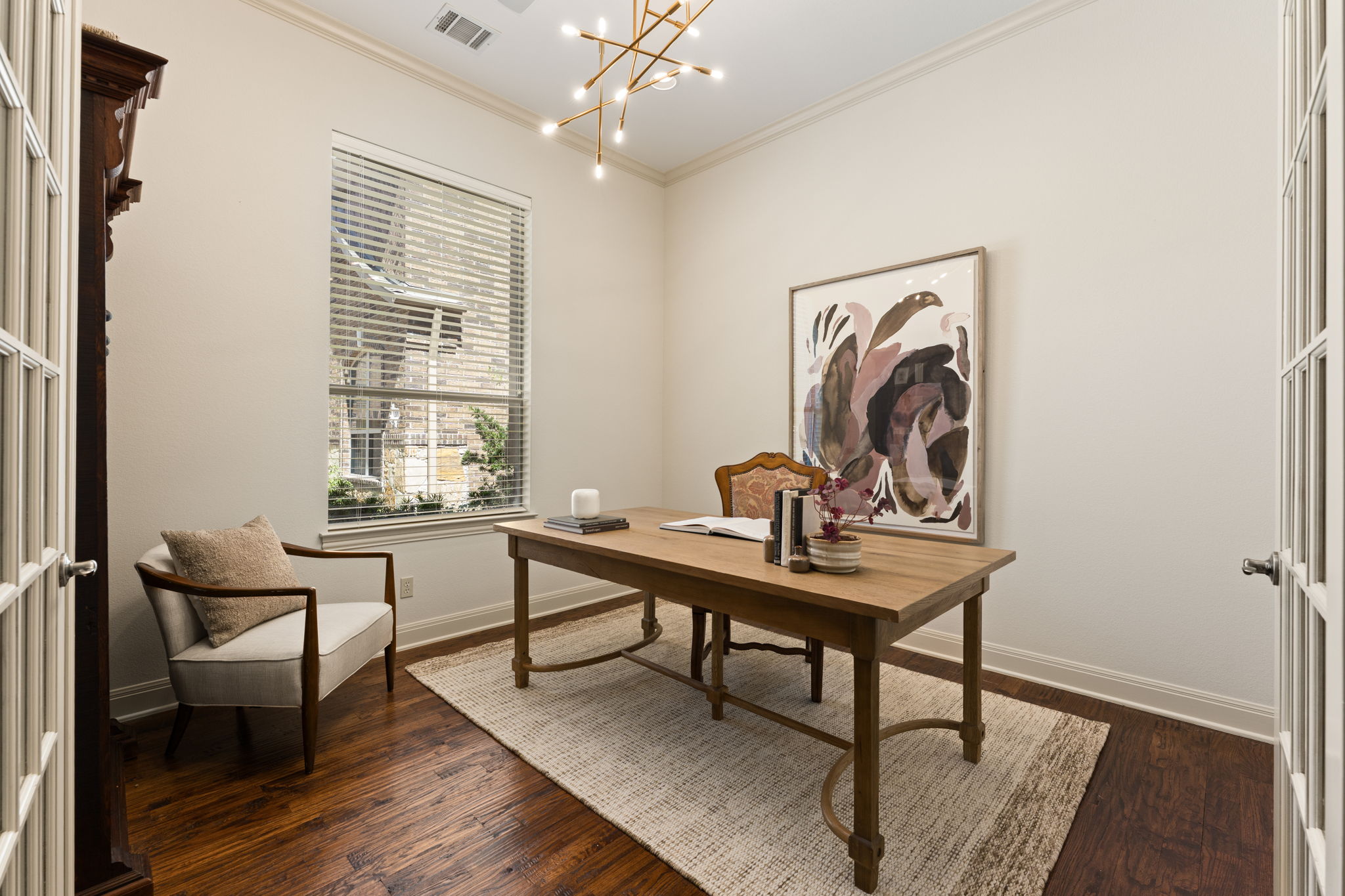 205 Emerald Ridge Drive Austin, TX 78732 - Photo 14 of 40 a view of a workspace with furniture and a window