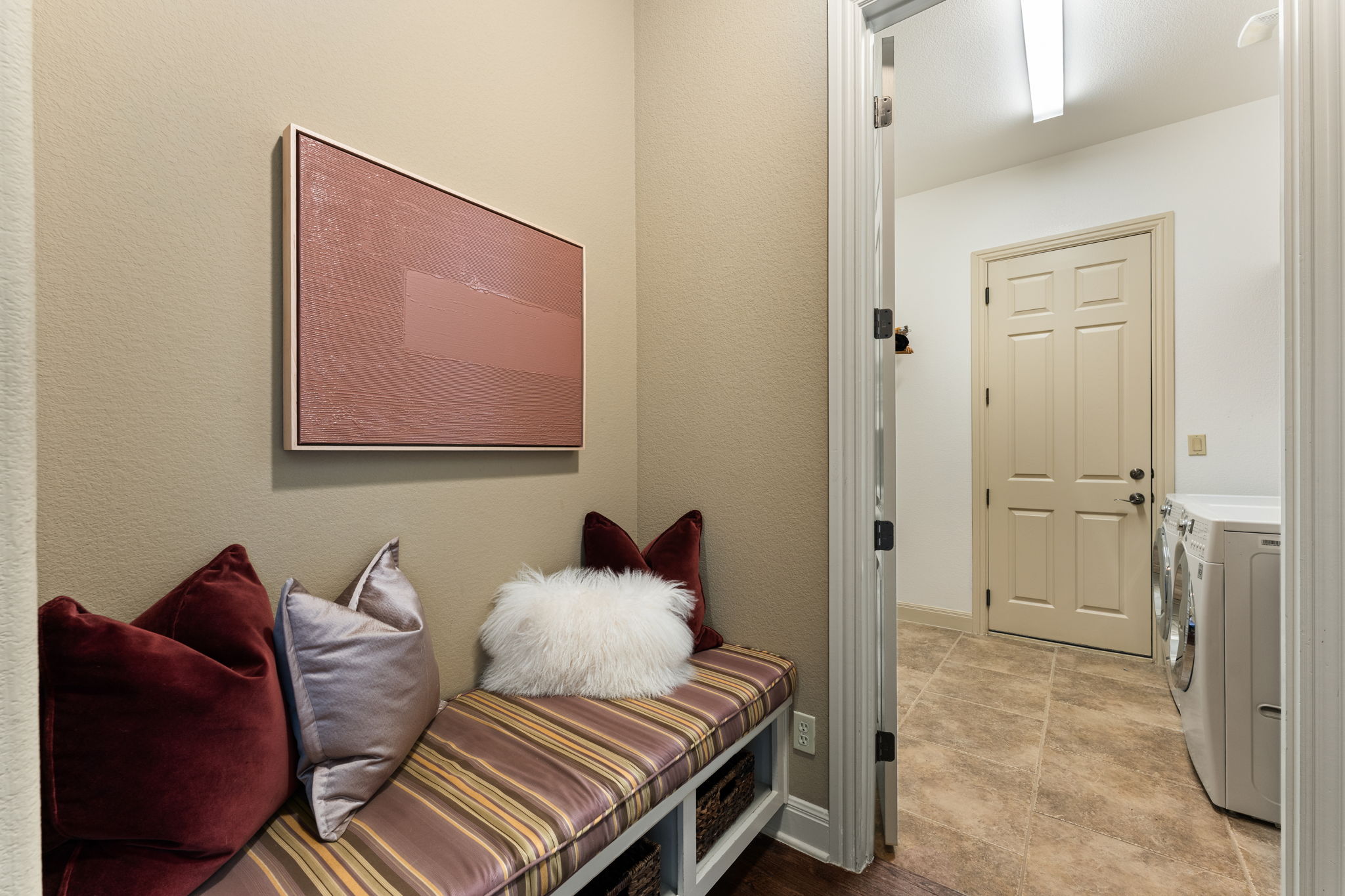 205 Emerald Ridge Drive Austin, TX 78732 - Photo 28 of 40 a bedroom with a bed and wooden floor