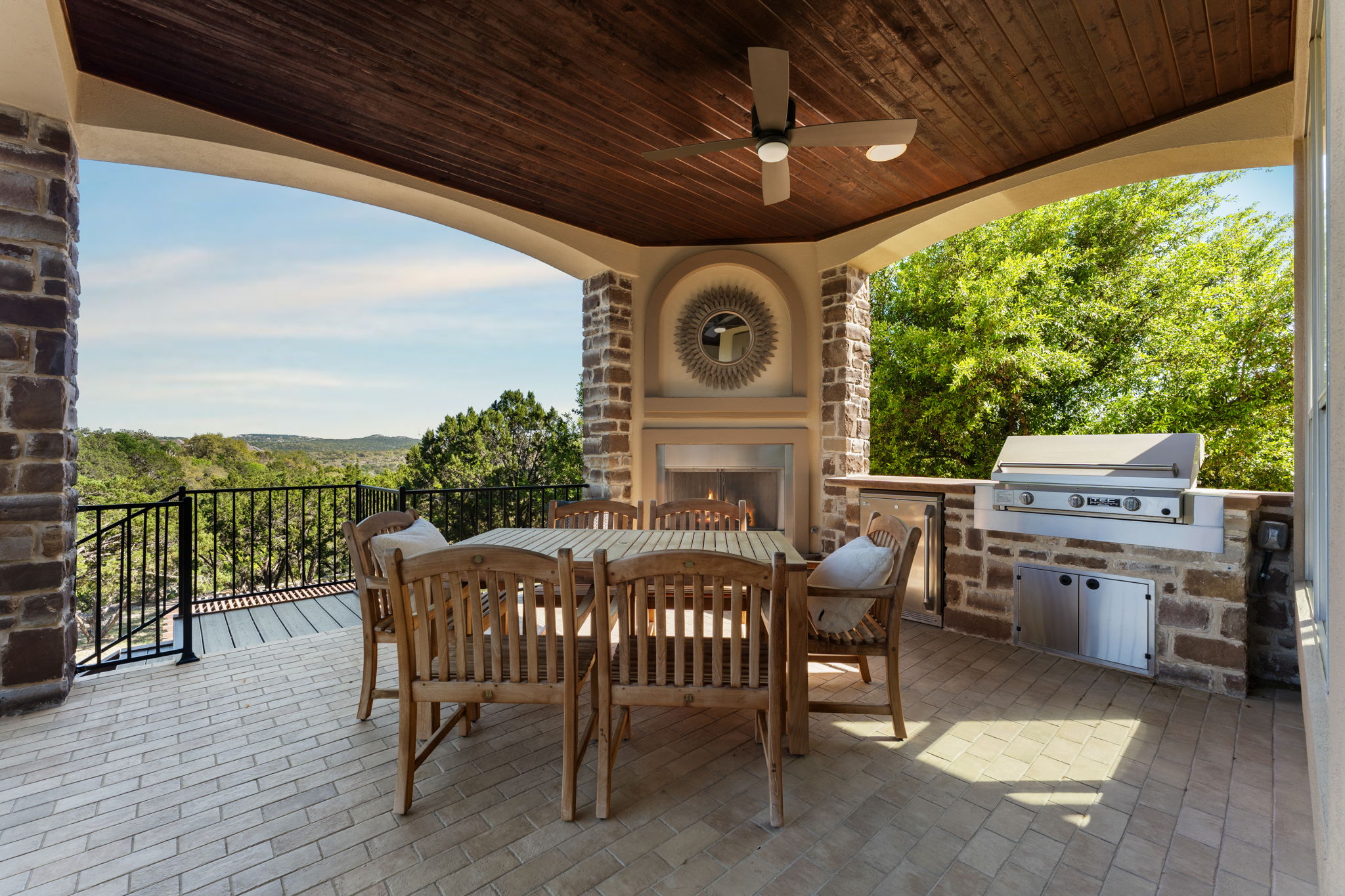 205 Emerald Ridge Drive Austin, TX 78732 - Photo 29 of 40 a view of a chairs and table in the roof deck