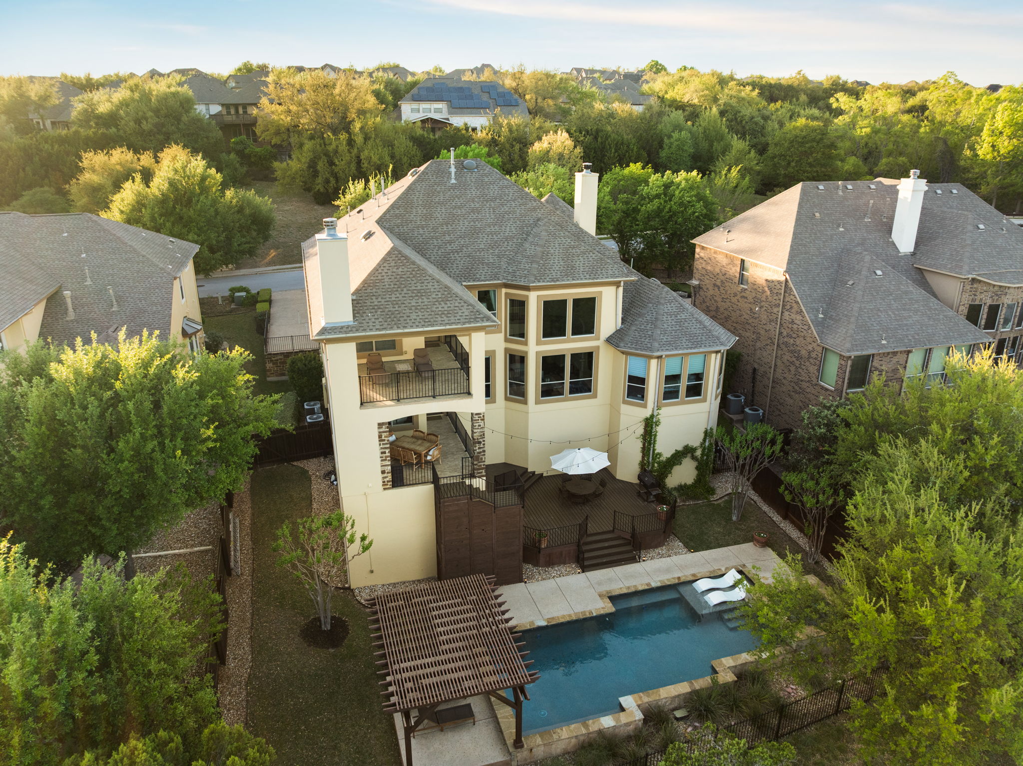 205 Emerald Ridge Drive Austin, TX 78732 - Photo 35 of 40 an aerial view of a house with a garden view