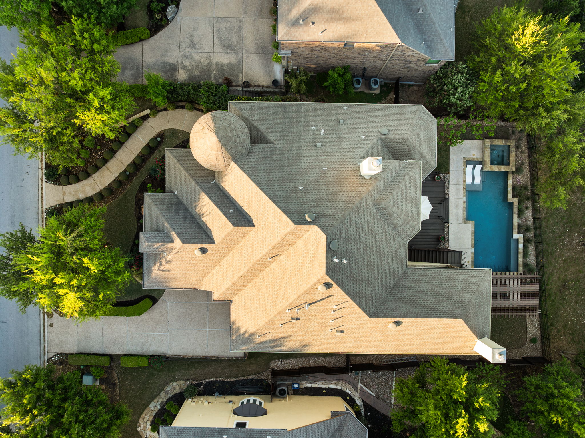 205 Emerald Ridge Drive Austin, TX 78732 - Photo 38 of 40 an aerial view of a house with a swimming pool
