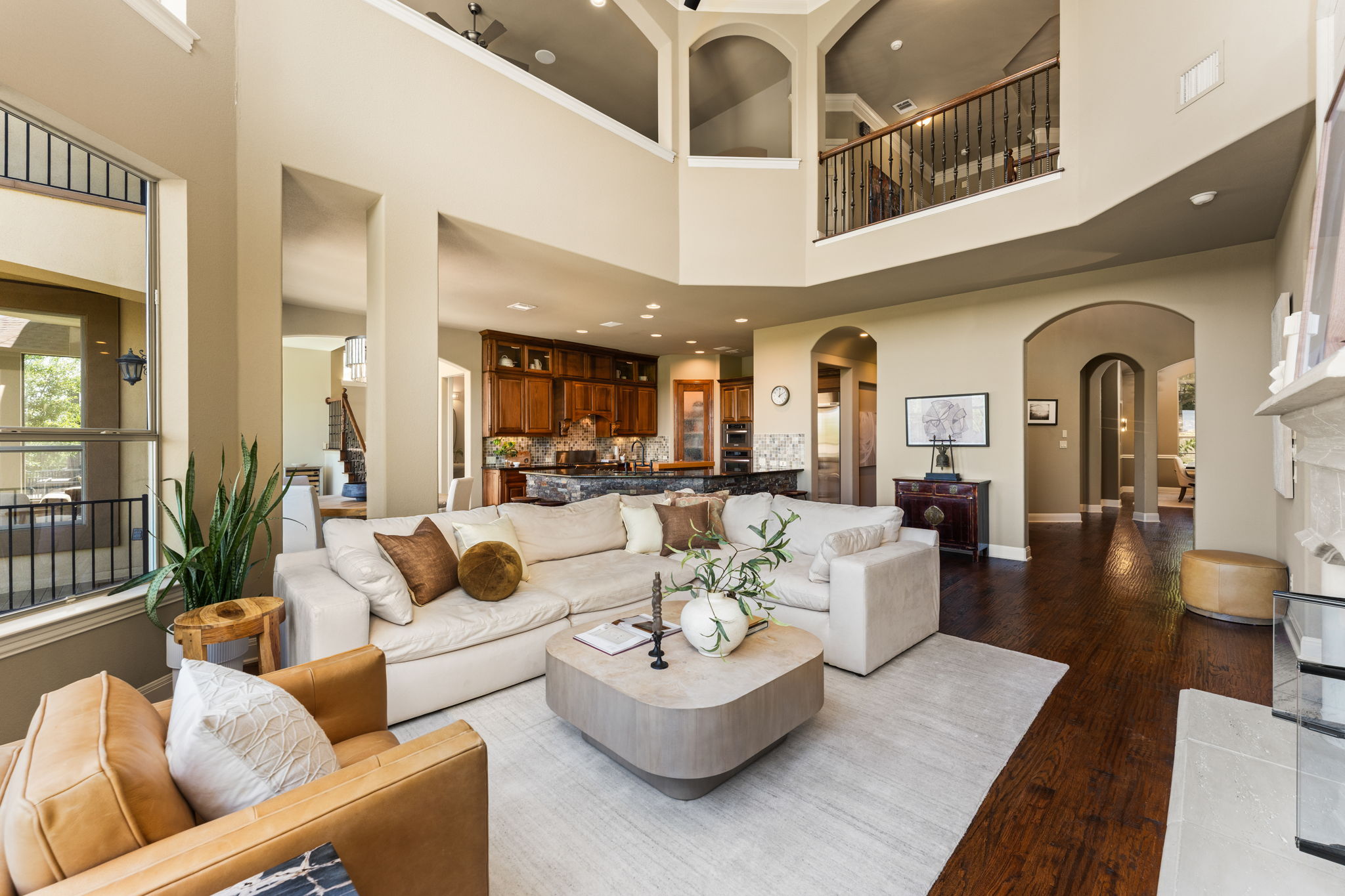 205 Emerald Ridge Drive Austin, TX 78732 - Photo 6 of 40 a living room with furniture and a large window